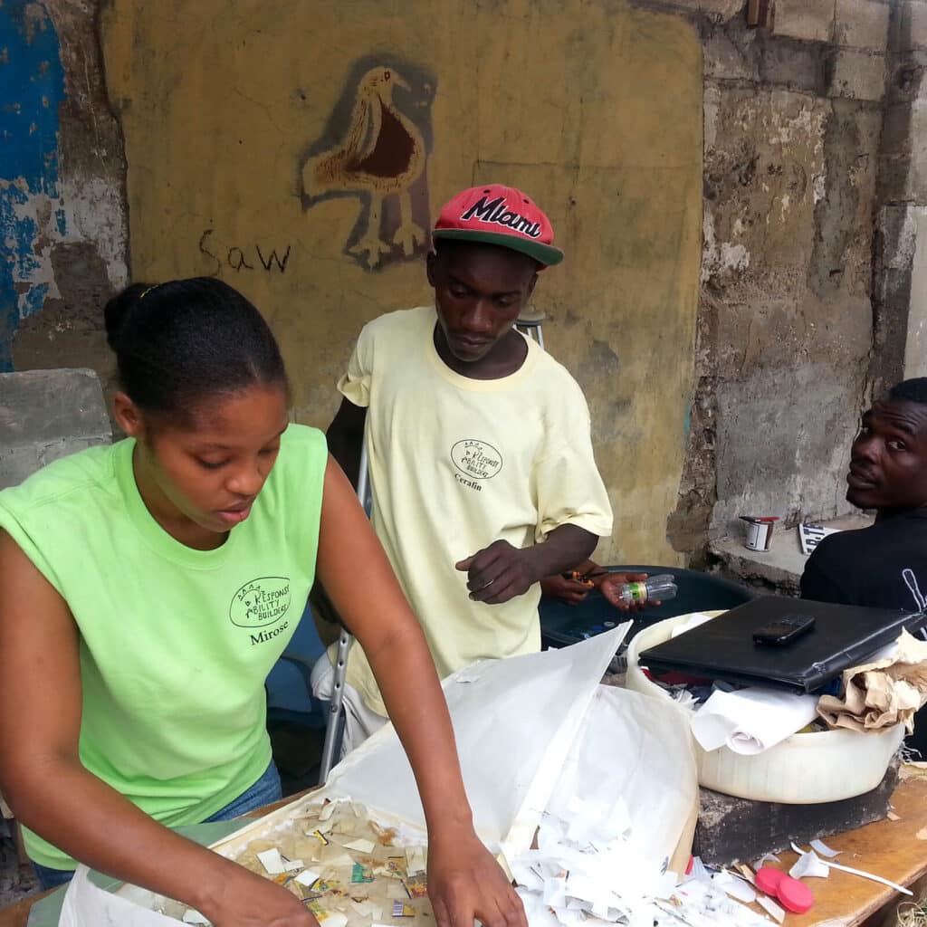 RAB_GALLERY Mirose, Cerafin, and Maxene lay out plastic wafers